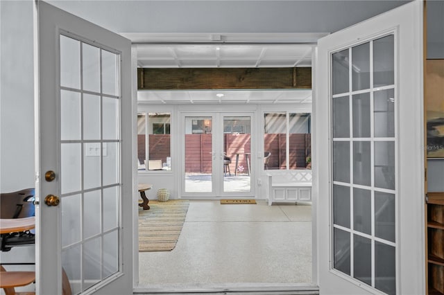 entryway featuring french doors