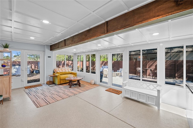 sunroom with speckled floor, recessed lighting, a wealth of natural light, and coffered ceiling