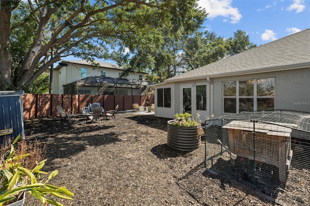 view of yard with a gazebo and fence
