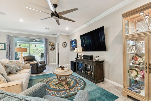 living room with ceiling fan, visible vents, crown molding, light tile patterned floors, and baseboards