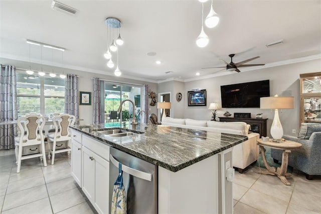 kitchen with stainless steel dishwasher, crown molding, visible vents, a sink, and light tile patterned floors