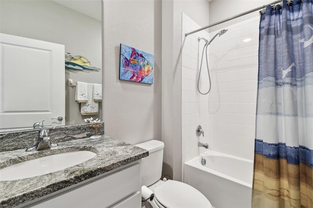 full bath with vanity, toilet, and shower / tub combo