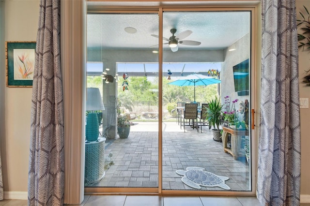 entryway with a ceiling fan