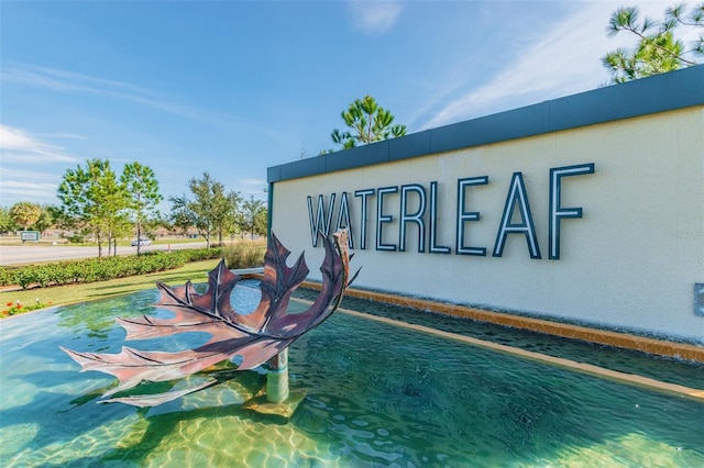 view of community sign