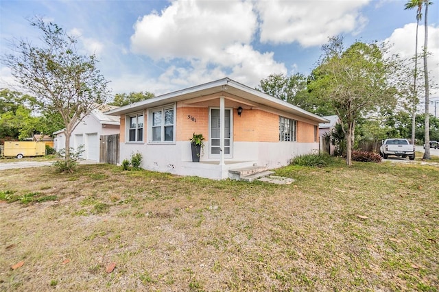 5101 13th Ave S, Gulfport, FL 33707 - view of front facade with a front lawn