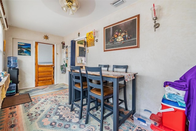 5101 13th Ave S, Gulfport, FL 33707 - dining area featuring visible vents and ceiling fan