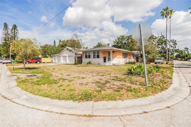 5101 13th Ave S, Gulfport, FL 33707 - bungalow-style home featuring a garage and brick siding