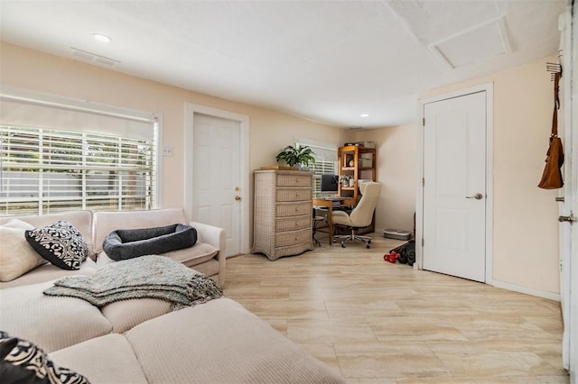 5101 13th Ave S, Gulfport, FL 33707 - living room featuring visible vents, attic access, baseboards, and recessed lighting