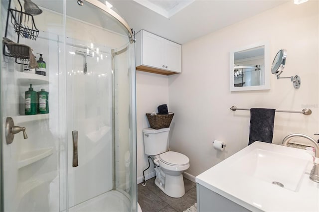 5101 13th Ave S, Gulfport, FL 33707 - bathroom featuring vanity, baseboards, a stall shower, and toilet