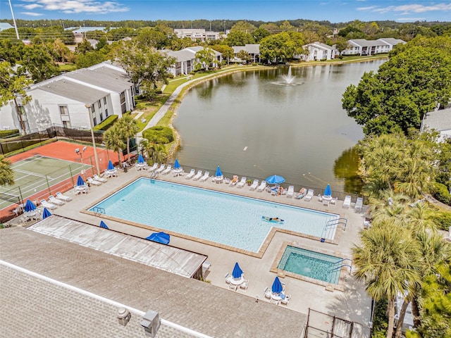 1281 Pine Ridge Cir E Unit H1, Tarpon Springs, FL 34688 - birds eye view of property featuring a water view