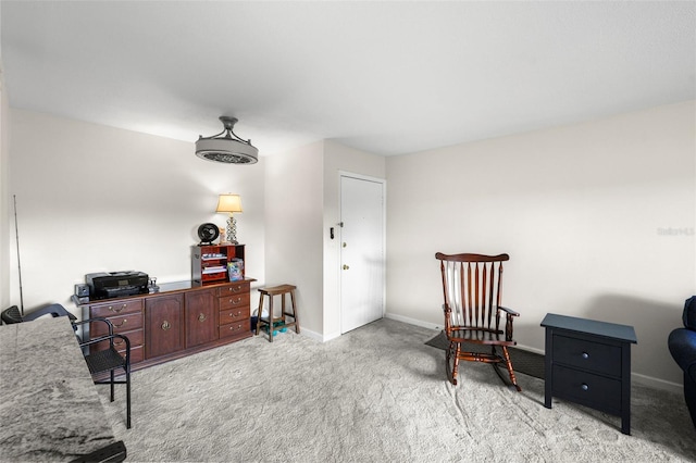 710 N Village Dr N Unit 102, Saint Petersburg, FL 33716 - sitting room featuring carpet flooring and baseboards
