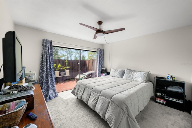 710 N Village Dr N Unit 102, Saint Petersburg, FL 33716 - carpeted bedroom featuring access to exterior and ceiling fan
