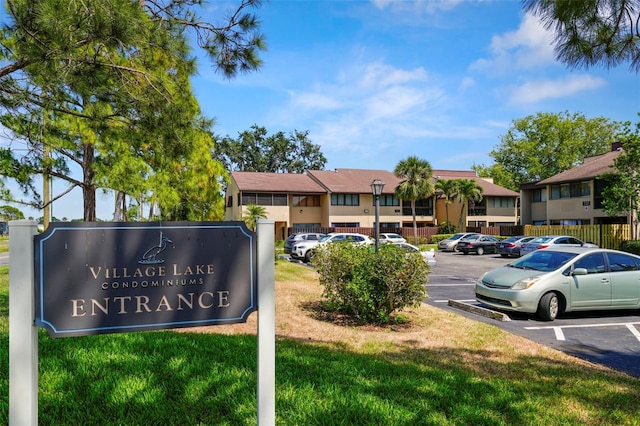 710 N Village Dr N Unit 102, Saint Petersburg, FL 33716 - exterior view of parking and a residential view
