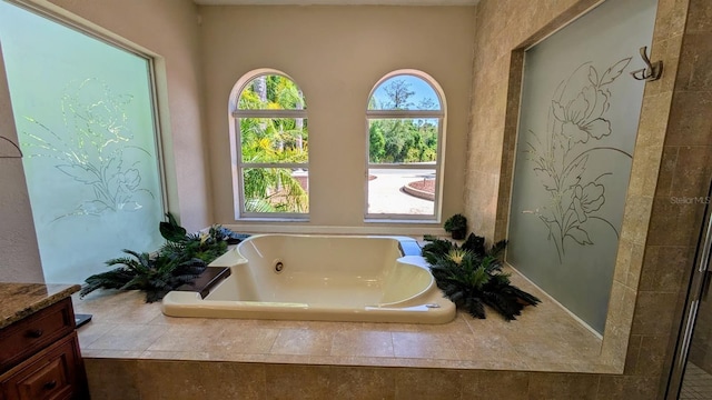4872 Silverthorne Ct, Oldsmar, FL 34677 - full bath featuring a jetted tub and vanity
