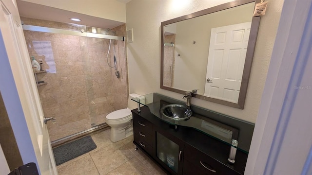 4872 Silverthorne Ct, Oldsmar, FL 34677 - bathroom featuring a stall shower, toilet, vanity, and tile patterned flooring