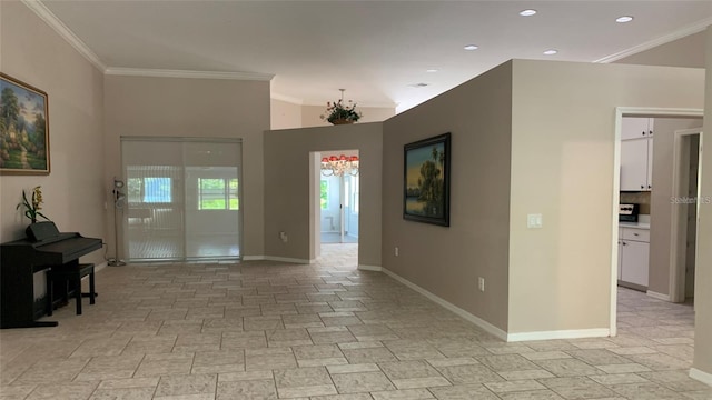 interior space with baseboards, ornamental molding, recessed lighting, and a notable chandelier
