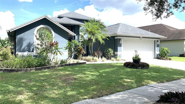 ranch-style house with concrete driveway, stucco siding, a front yard, and a garage
