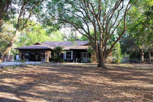 16536 Caldwell Ln, Spring Hill, FL 34610 - view of front of home with a shingled roof