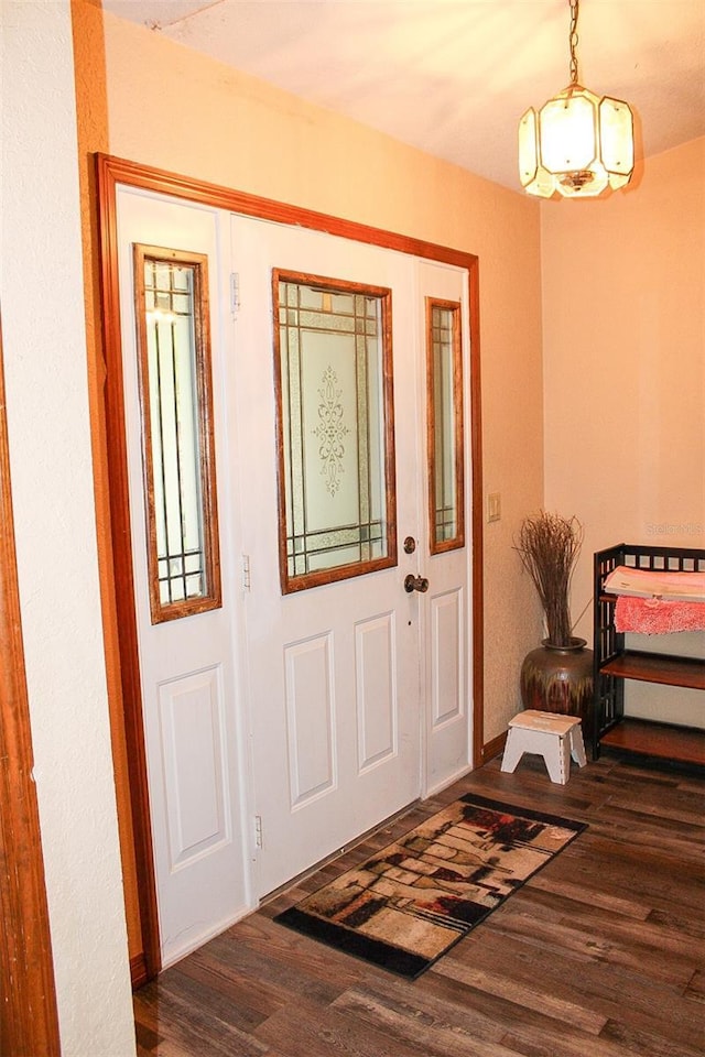 16536 Caldwell Ln, Spring Hill, FL 34610 - entrance foyer featuring wood finished floors