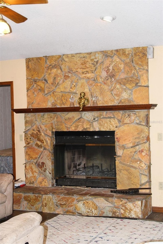 16536 Caldwell Ln, Spring Hill, FL 34610 - details with a stone fireplace and a ceiling fan