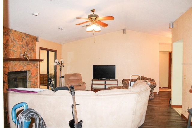 16536 Caldwell Ln, Spring Hill, FL 34610 - living room with ceiling fan, a stone fireplace, baseboards, dark wood-style floors, and lofted ceiling