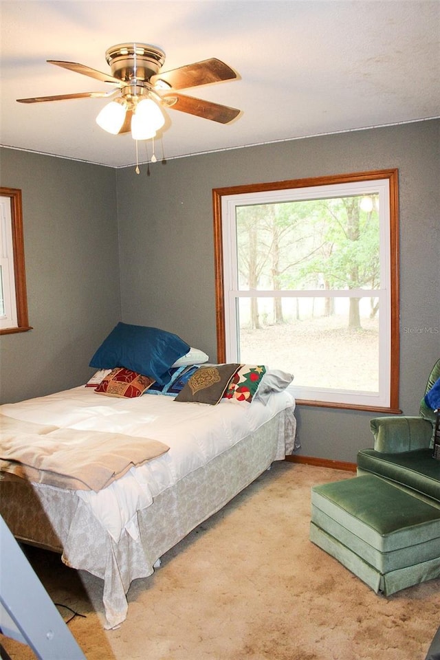 16536 Caldwell Ln, Spring Hill, FL 34610 - carpeted bedroom featuring a ceiling fan