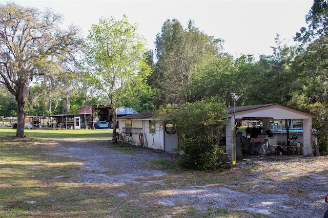 16536 Caldwell Ln, Spring Hill, FL 34610 - exterior space featuring a detached carport