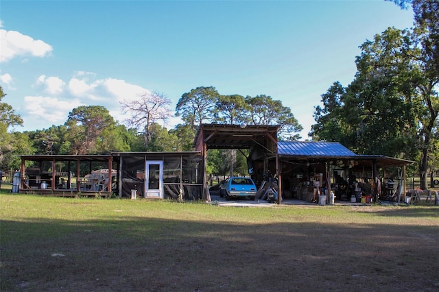 16536 Caldwell Ln, Spring Hill, FL 34610 - view of property's community with a lawn and a detached carport