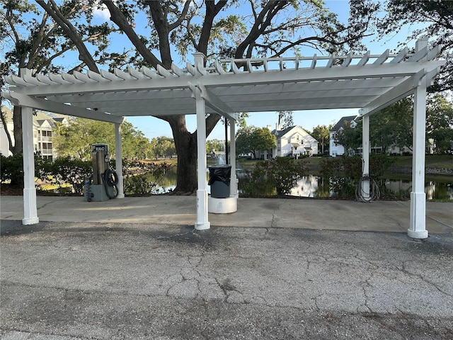 3260 Haviland Ct Unit 202, Palm Harbor, FL 34684 - view of parking / parking lot featuring a water view