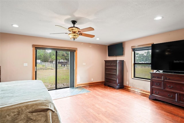 bedroom featuring access to outside, light wood-style flooring, recessed lighting, baseboards, and ceiling fan