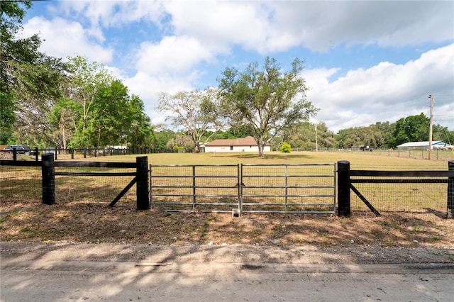 gate with a view of rural / pastoral area