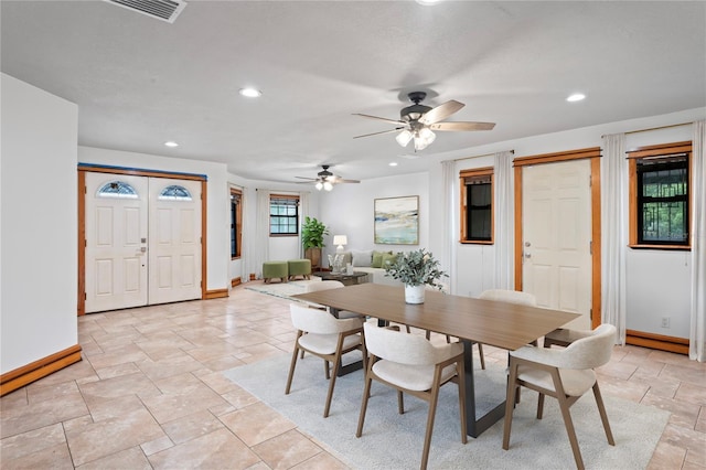 39427 Comstock Ln, Zephyrhills, FL 33540 - dining room featuring baseboards, stone tile floors, recessed lighting, and a ceiling fan