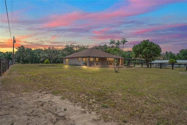 39427 Comstock Ln, Zephyrhills, FL 33540 - view of yard at dusk