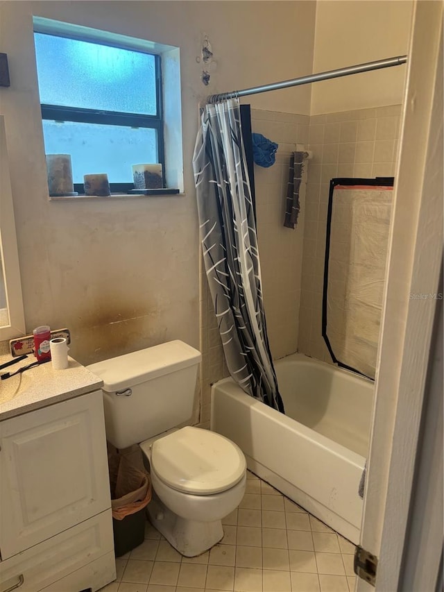 full bath featuring toilet, shower / bath combo, tile patterned flooring, and vanity