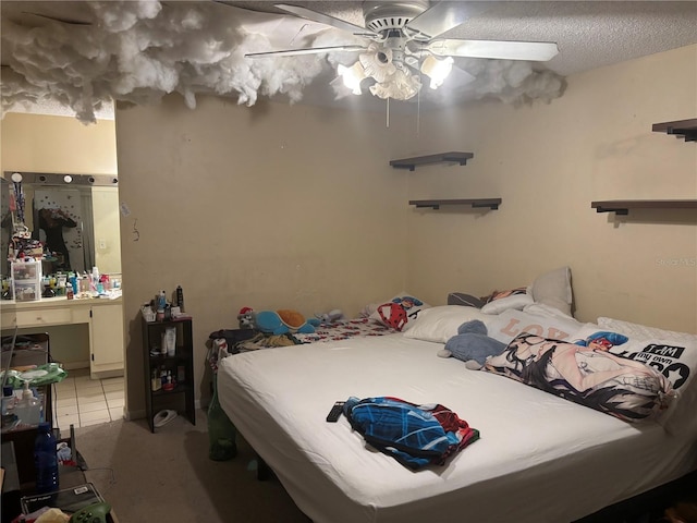 bedroom with light tile patterned floors and ceiling fan