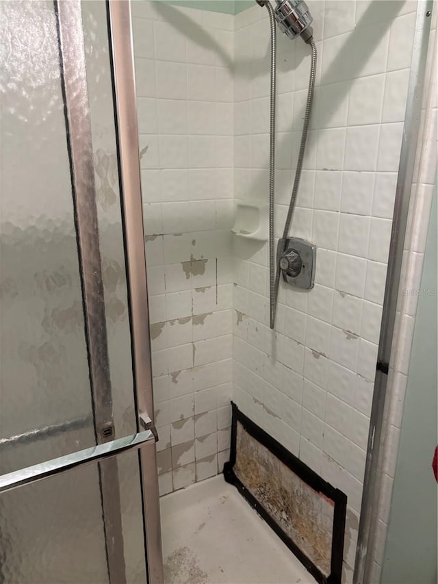 full bath featuring a stall shower