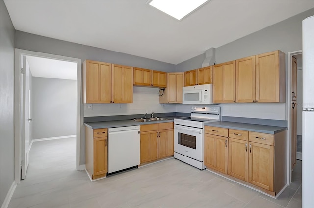 6601 13th St N, Saint Petersburg, FL 33702 - kitchen with a sink, dark countertops, light brown cabinets, and white appliances