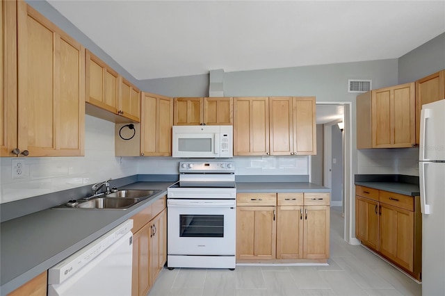 6601 13th St N, Saint Petersburg, FL 33702 - kitchen featuring visible vents, light brown cabinetry, tasteful backsplash, a sink, and white appliances