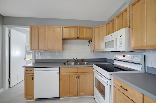 6601 13th St N, Saint Petersburg, FL 33702 - kitchen featuring a sink, light brown cabinetry, and white appliances