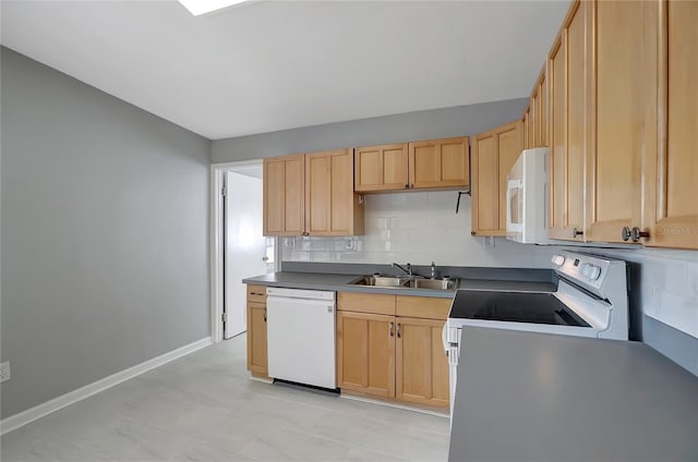 6601 13th St N, Saint Petersburg, FL 33702 - kitchen with tasteful backsplash, a sink, baseboards, light brown cabinets, and white appliances