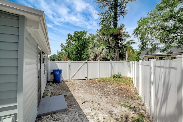 6601 13th St N, Saint Petersburg, FL 33702 - view of yard with a gate and a fenced backyard