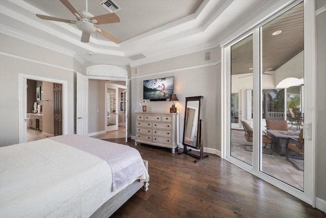 bedroom featuring baseboards, dark wood finished floors, and visible vents