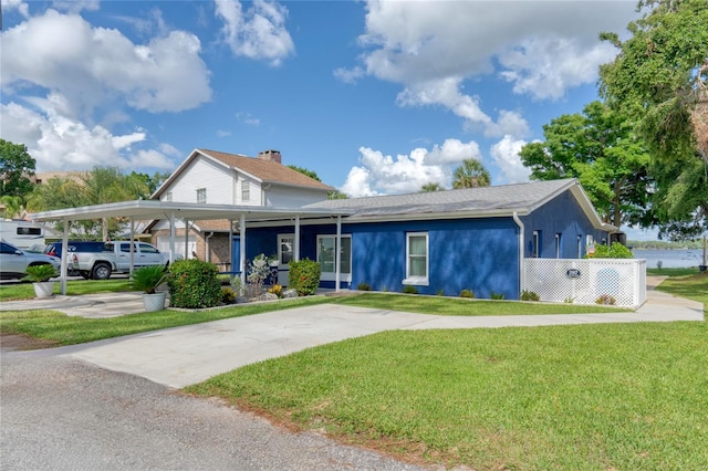 297 Lakeview Dr, Tarpon Springs, FL 34689 - view of front of house featuring a front lawn