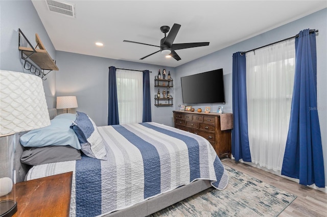 297 Lakeview Dr, Tarpon Springs, FL 34689 - bedroom featuring wood finished floors, ceiling fan, and recessed lighting