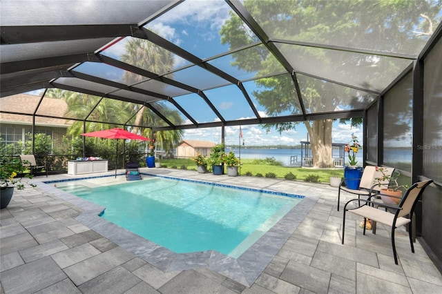 297 Lakeview Dr, Tarpon Springs, FL 34689 - outdoor pool with a water view, a patio area, and glass enclosure