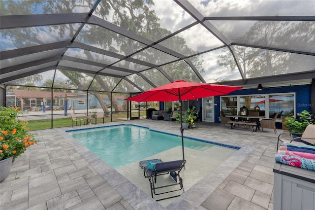 297 Lakeview Dr, Tarpon Springs, FL 34689 - swimming pool featuring an outdoor hangout area, a patio area, and glass enclosure