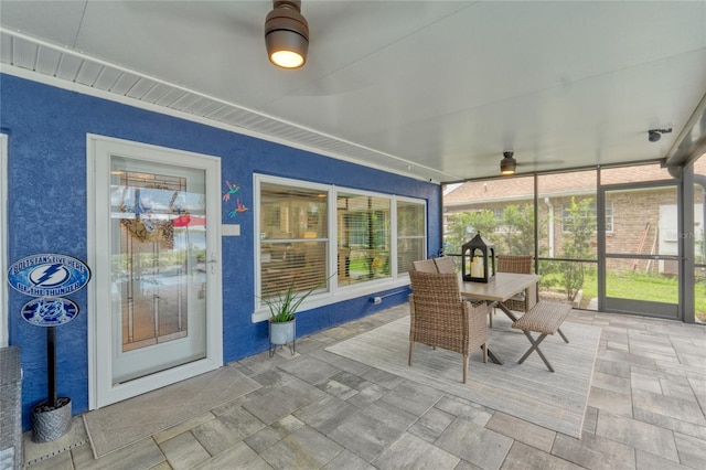 297 Lakeview Dr, Tarpon Springs, FL 34689 - sunroom featuring outdoor dining area and a ceiling fan