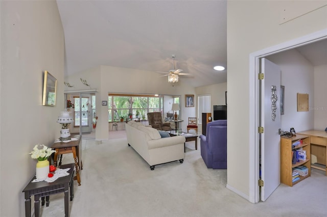 living room with carpet flooring, ceiling fan, and baseboards