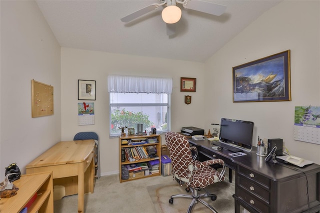 office space with carpet floors, baseboards, ceiling fan, and lofted ceiling