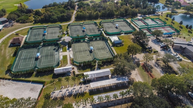 bird's eye view featuring a water view and golf course view
